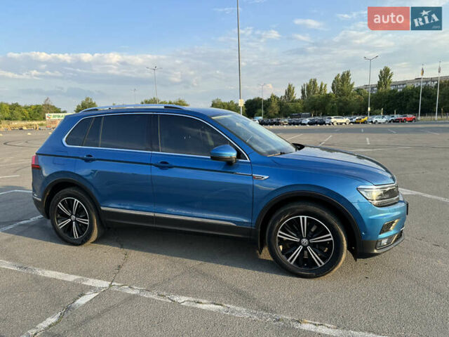 Синий Фольксваген Тигуан, объемом двигателя 1.97 л и пробегом 235 тыс. км за 25000 $, фото 6 на Automoto.ua
