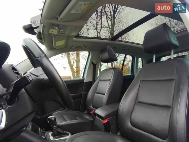 Синий Фольксваген Тигуан, объемом двигателя 1.98 л и пробегом 165 тыс. км за 13400 $, фото 25 на Automoto.ua
