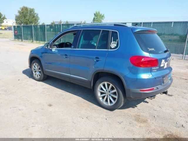 Синий Фольксваген Тигуан, объемом двигателя 2 л и пробегом 63 тыс. км за 1800 $, фото 2 на Automoto.ua