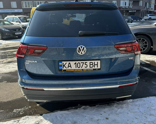 Синій Фольксваген Тігуан, об'ємом двигуна 2 л та пробігом 99 тис. км за 19000 $, фото 4 на Automoto.ua