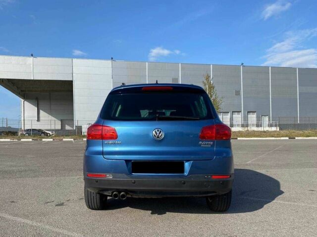 Синій Фольксваген Тігуан, об'ємом двигуна 2 л та пробігом 170 тис. км за 14000 $, фото 3 на Automoto.ua