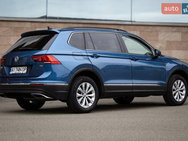 Синий Фольксваген Тигуан, объемом двигателя 2 л и пробегом 140 тыс. км за 18000 $, фото 1 на Automoto.ua