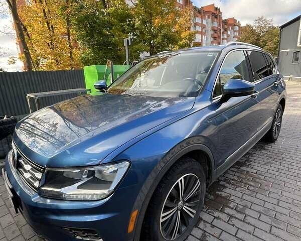 Синий Фольксваген Тигуан, объемом двигателя 2 л и пробегом 144 тыс. км за 19500 $, фото 2 на Automoto.ua