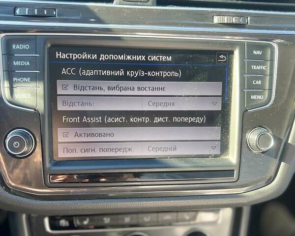 Синій Фольксваген Тігуан, об'ємом двигуна 1.97 л та пробігом 260 тис. км за 22800 $, фото 21 на Automoto.ua