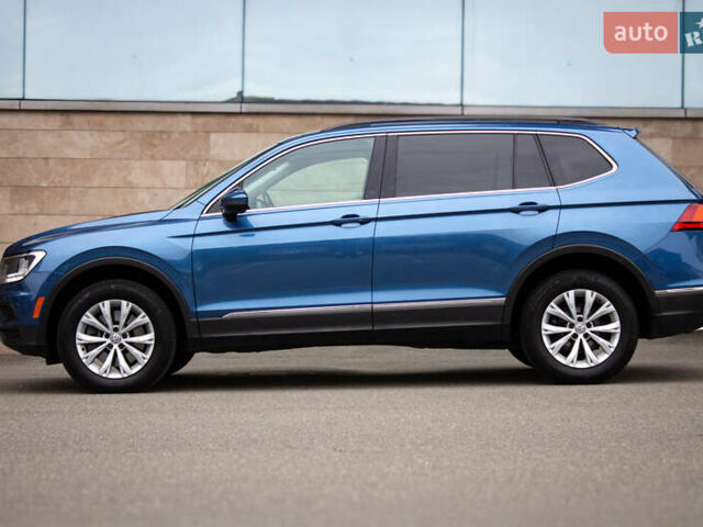 Синий Фольксваген Тигуан, объемом двигателя 2 л и пробегом 140 тыс. км за 18000 $, фото 3 на Automoto.ua