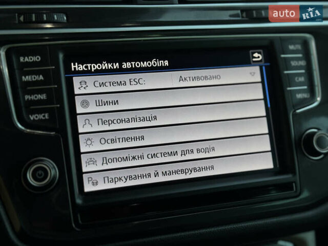 Синий Фольксваген Тигуан, объемом двигателя 2 л и пробегом 253 тыс. км за 22600 $, фото 34 на Automoto.ua