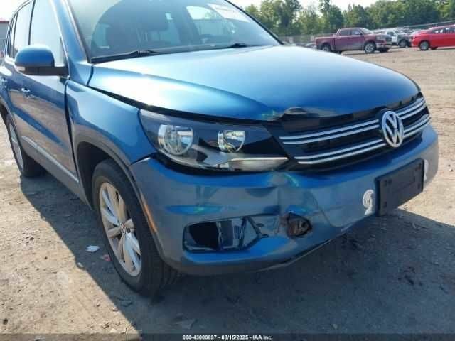 Синий Фольксваген Тигуан, объемом двигателя 2 л и пробегом 63 тыс. км за 1800 $, фото 5 на Automoto.ua