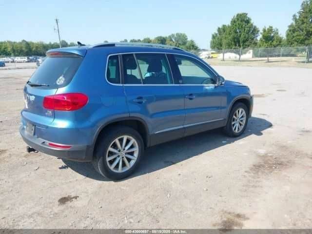 Синий Фольксваген Тигуан, объемом двигателя 2 л и пробегом 63 тыс. км за 1800 $, фото 3 на Automoto.ua