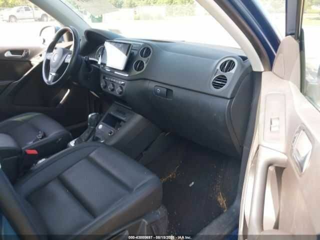 Синий Фольксваген Тигуан, объемом двигателя 2 л и пробегом 63 тыс. км за 1800 $, фото 4 на Automoto.ua