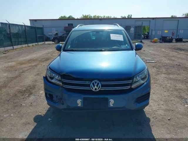 Синий Фольксваген Тигуан, объемом двигателя 2 л и пробегом 63 тыс. км за 1800 $, фото 11 на Automoto.ua