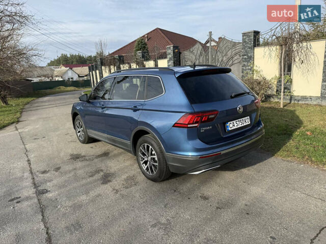 Синій Фольксваген Тігуан, об'ємом двигуна 1.98 л та пробігом 93 тис. км за 19500 $, фото 13 на Automoto.ua