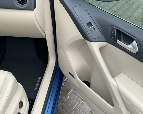 Синий Фольксваген Тигуан, объемом двигателя 2 л и пробегом 149 тыс. км за 16950 $, фото 61 на Automoto.ua