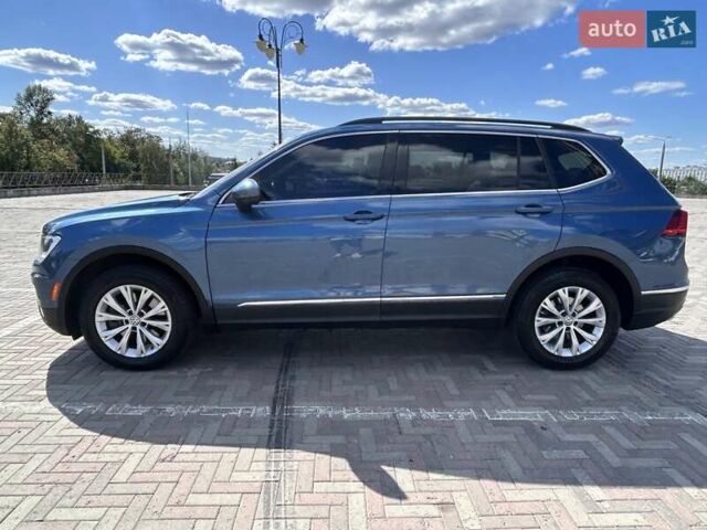 Синій Фольксваген Тігуан, об'ємом двигуна 1.98 л та пробігом 118 тис. км за 18700 $, фото 5 на Automoto.ua