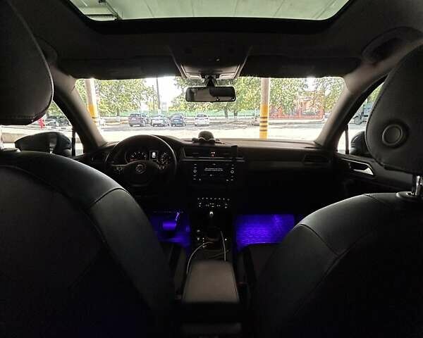 Синій Фольксваген Тігуан, об'ємом двигуна 1.98 л та пробігом 118 тис. км за 18700 $, фото 9 на Automoto.ua