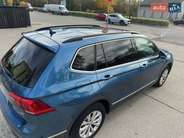 Синій Фольксваген Тігуан, об'ємом двигуна 1.98 л та пробігом 119 тис. км за 20999 $, фото 12 на Automoto.ua