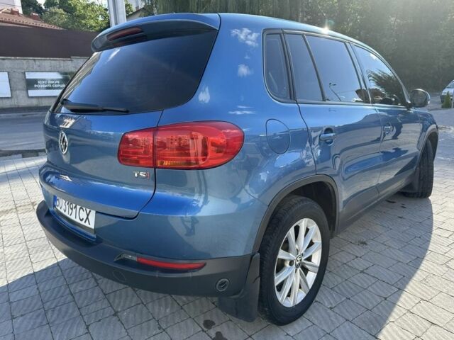 Синій Фольксваген Тігуан, об'ємом двигуна 2 л та пробігом 77 тис. км за 14500 $, фото 4 на Automoto.ua