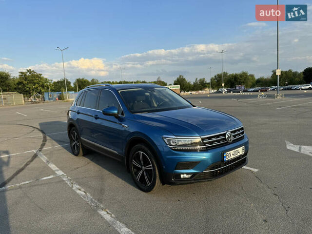 Синий Фольксваген Тигуан, объемом двигателя 1.97 л и пробегом 235 тыс. км за 25000 $, фото 11 на Automoto.ua