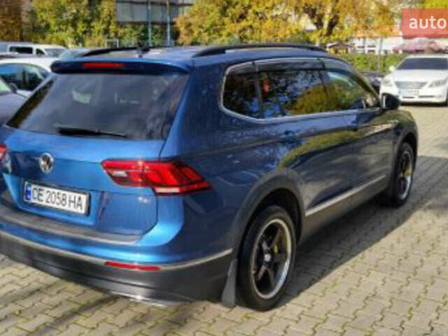 Синій Фольксваген Тігуан, об'ємом двигуна 1.98 л та пробігом 124 тис. км за 16000 $, фото 4 на Automoto.ua