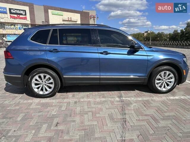 Синій Фольксваген Тігуан, об'ємом двигуна 1.98 л та пробігом 118 тис. км за 18700 $, фото 4 на Automoto.ua
