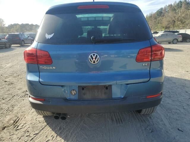 Синий Фольксваген Тигуан, объемом двигателя 2 л и пробегом 205 тыс. км за 6100 $, фото 4 на Automoto.ua