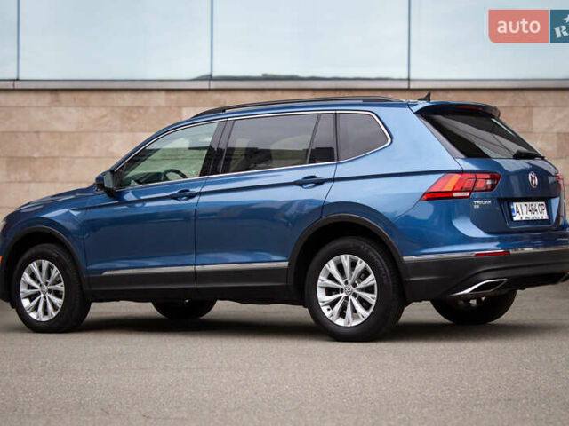 Синий Фольксваген Тигуан, объемом двигателя 2 л и пробегом 140 тыс. км за 18000 $, фото 4 на Automoto.ua