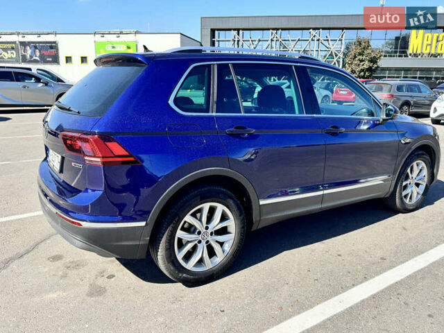 Синій Фольксваген Тігуан, об'ємом двигуна 1.98 л та пробігом 95 тис. км за 28000 $, фото 4 на Automoto.ua