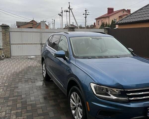 Синій Фольксваген Тігуан, об'ємом двигуна 2 л та пробігом 193 тис. км за 14700 $, фото 4 на Automoto.ua