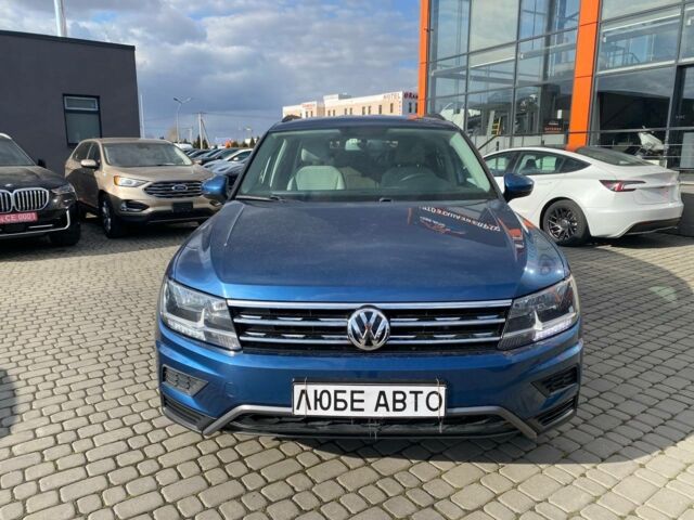 Синий Фольксваген Тигуан, объемом двигателя 2 л и пробегом 142 тыс. км за 16900 $, фото 1 на Automoto.ua