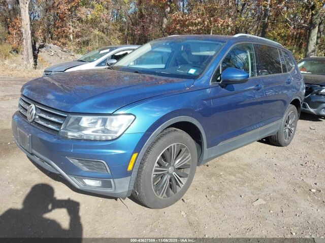 Синий Фольксваген Тигуан, объемом двигателя 2 л и пробегом 137 тыс. км за 12200 $, фото 1 на Automoto.ua