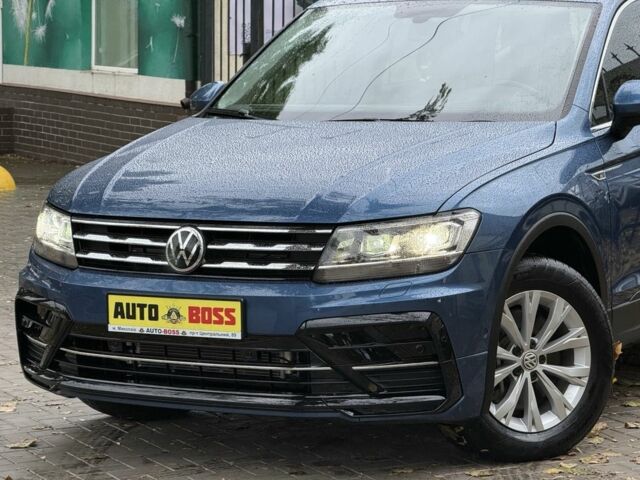 Синій Фольксваген Тігуан, об'ємом двигуна 2 л та пробігом 103 тис. км за 18999 $, фото 1 на Automoto.ua