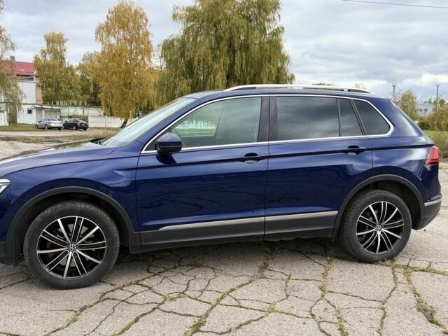 Синій Фольксваген Тігуан, об'ємом двигуна 2 л та пробігом 234 тис. км за 28400 $, фото 5 на Automoto.ua