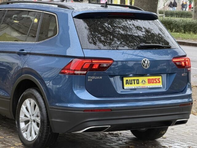 Синій Фольксваген Тігуан, об'ємом двигуна 2 л та пробігом 103 тис. км за 18999 $, фото 9 на Automoto.ua
