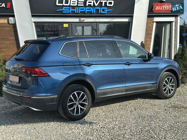 Синий Фольксваген Тигуан, объемом двигателя 2 л и пробегом 233 тыс. км за 15700 $, фото 3 на Automoto.ua