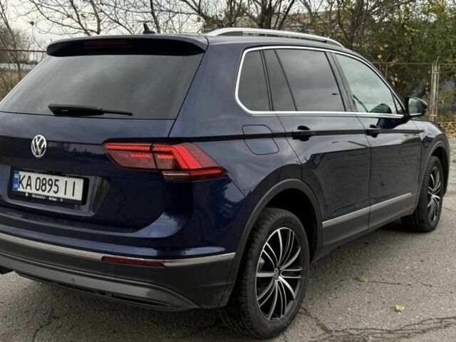Синій Фольксваген Тігуан, об'ємом двигуна 2 л та пробігом 234 тис. км за 28400 $, фото 2 на Automoto.ua