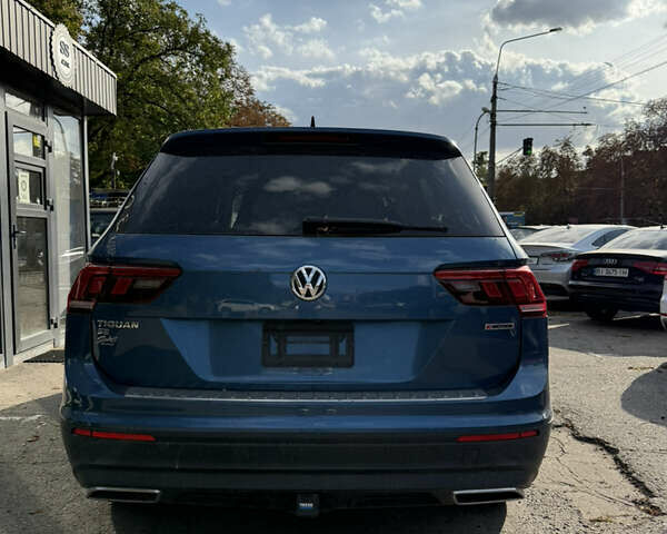 Синий Фольксваген Тигуан, объемом двигателя 2 л и пробегом 128 тыс. км за 18500 $, фото 4 на Automoto.ua