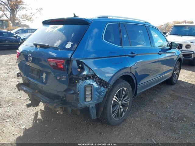 Синий Фольксваген Тигуан, объемом двигателя 2 л и пробегом 137 тыс. км за 12200 $, фото 3 на Automoto.ua