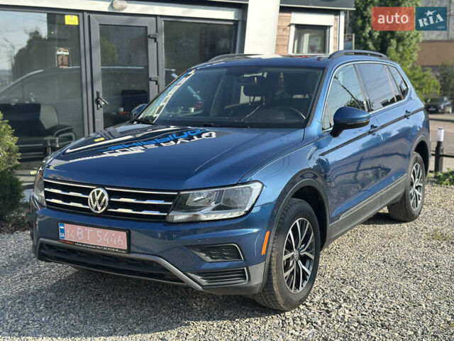 Синий Фольксваген Тигуан, объемом двигателя 2 л и пробегом 233 тыс. км за 15700 $, фото 1 на Automoto.ua