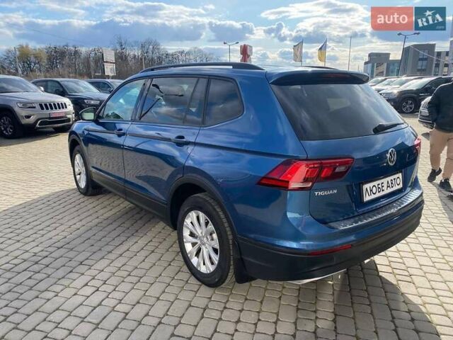 Синій Фольксваген Тігуан, об'ємом двигуна 2 л та пробігом 142 тис. км за 15300 $, фото 4 на Automoto.ua