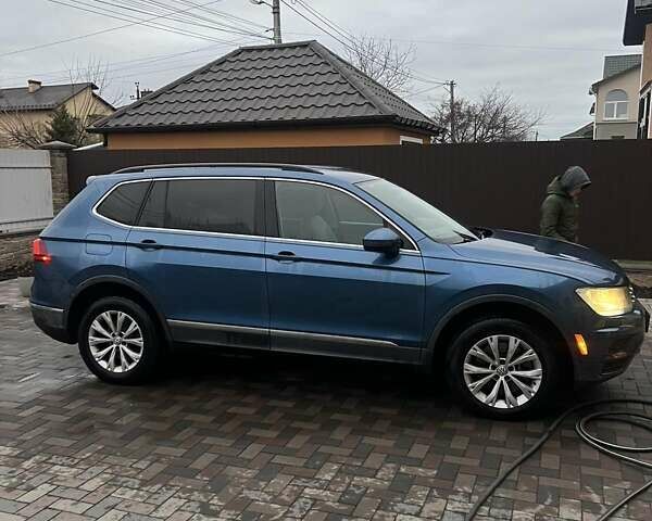 Синій Фольксваген Тігуан, об'ємом двигуна 2 л та пробігом 193 тис. км за 14700 $, фото 6 на Automoto.ua