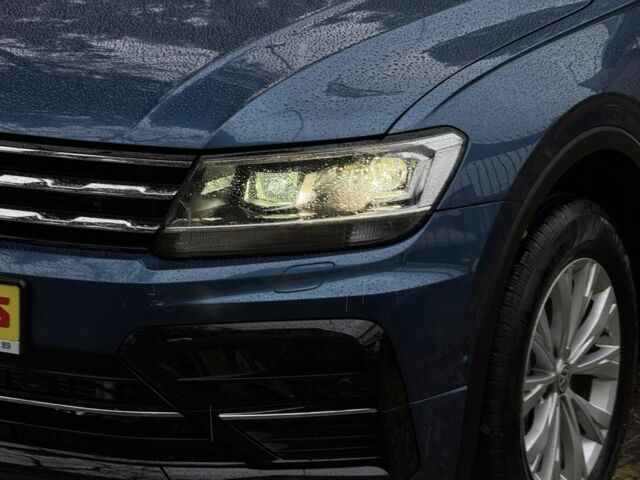 Синій Фольксваген Тігуан, об'ємом двигуна 2 л та пробігом 103 тис. км за 18999 $, фото 7 на Automoto.ua