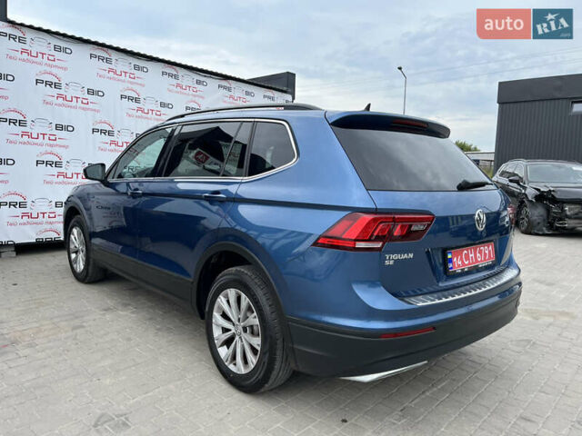 Синій Фольксваген Тігуан, об'ємом двигуна 2 л та пробігом 120 тис. км за 18500 $, фото 5 на Automoto.ua