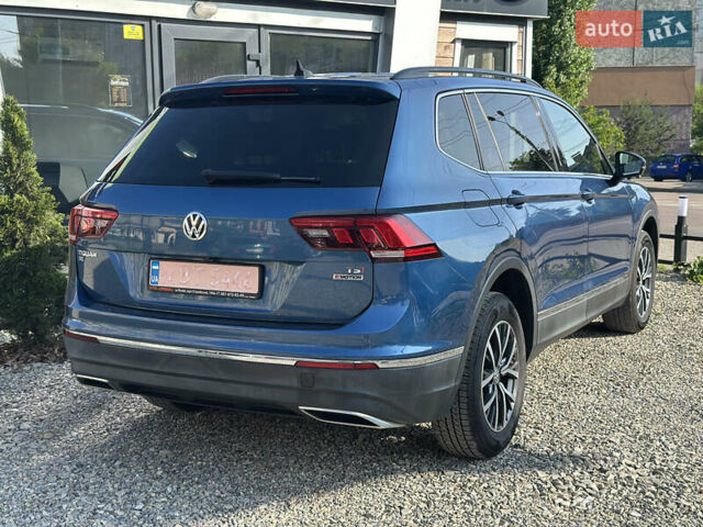 Синий Фольксваген Тигуан, объемом двигателя 2 л и пробегом 233 тыс. км за 15700 $, фото 4 на Automoto.ua
