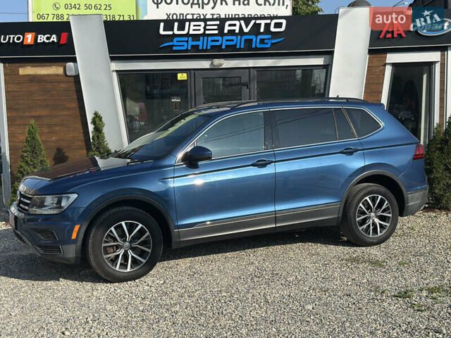 Синий Фольксваген Тигуан, объемом двигателя 2 л и пробегом 233 тыс. км за 15700 $, фото 2 на Automoto.ua