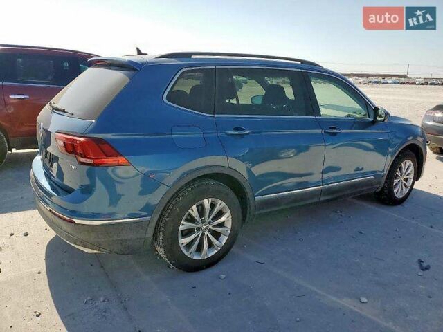 Синий Фольксваген Тигуан, объемом двигателя 2 л и пробегом 152 тыс. км за 4500 $, фото 2 на Automoto.ua