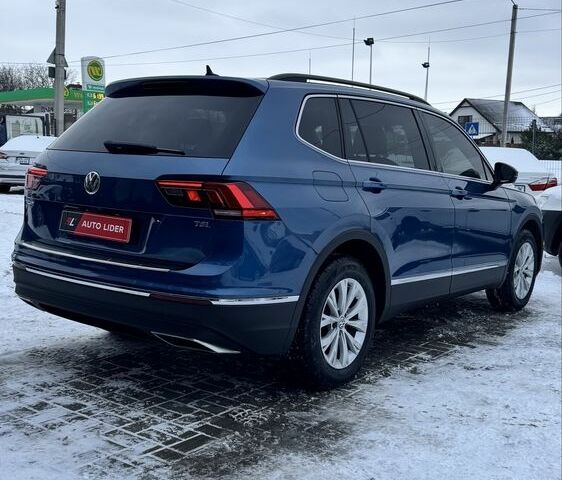 Синий Фольксваген Тигуан, объемом двигателя 2 л и пробегом 142 тыс. км за 18600 $, фото 3 на Automoto.ua