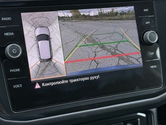 Синій Фольксваген Тігуан, об'ємом двигуна 2 л та пробігом 234 тис. км за 28400 $, фото 3 на Automoto.ua