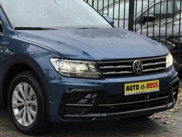 Синій Фольксваген Тігуан, об'ємом двигуна 2 л та пробігом 103 тис. км за 18999 $, фото 5 на Automoto.ua