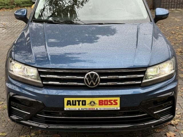 Синій Фольксваген Тігуан, об'ємом двигуна 2 л та пробігом 103 тис. км за 18999 $, фото 4 на Automoto.ua