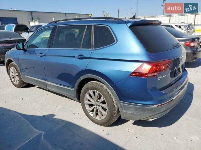 Синий Фольксваген Тигуан, объемом двигателя 2 л и пробегом 152 тыс. км за 4500 $, фото 1 на Automoto.ua