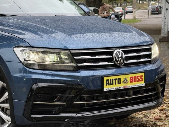 Синій Фольксваген Тігуан, об'ємом двигуна 2 л та пробігом 103 тис. км за 18999 $, фото 3 на Automoto.ua